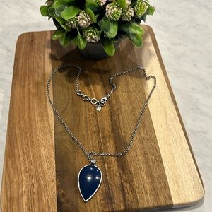 Lucky Brand Necklace- dark blue stone- silver chain. Measures at 26 inches-